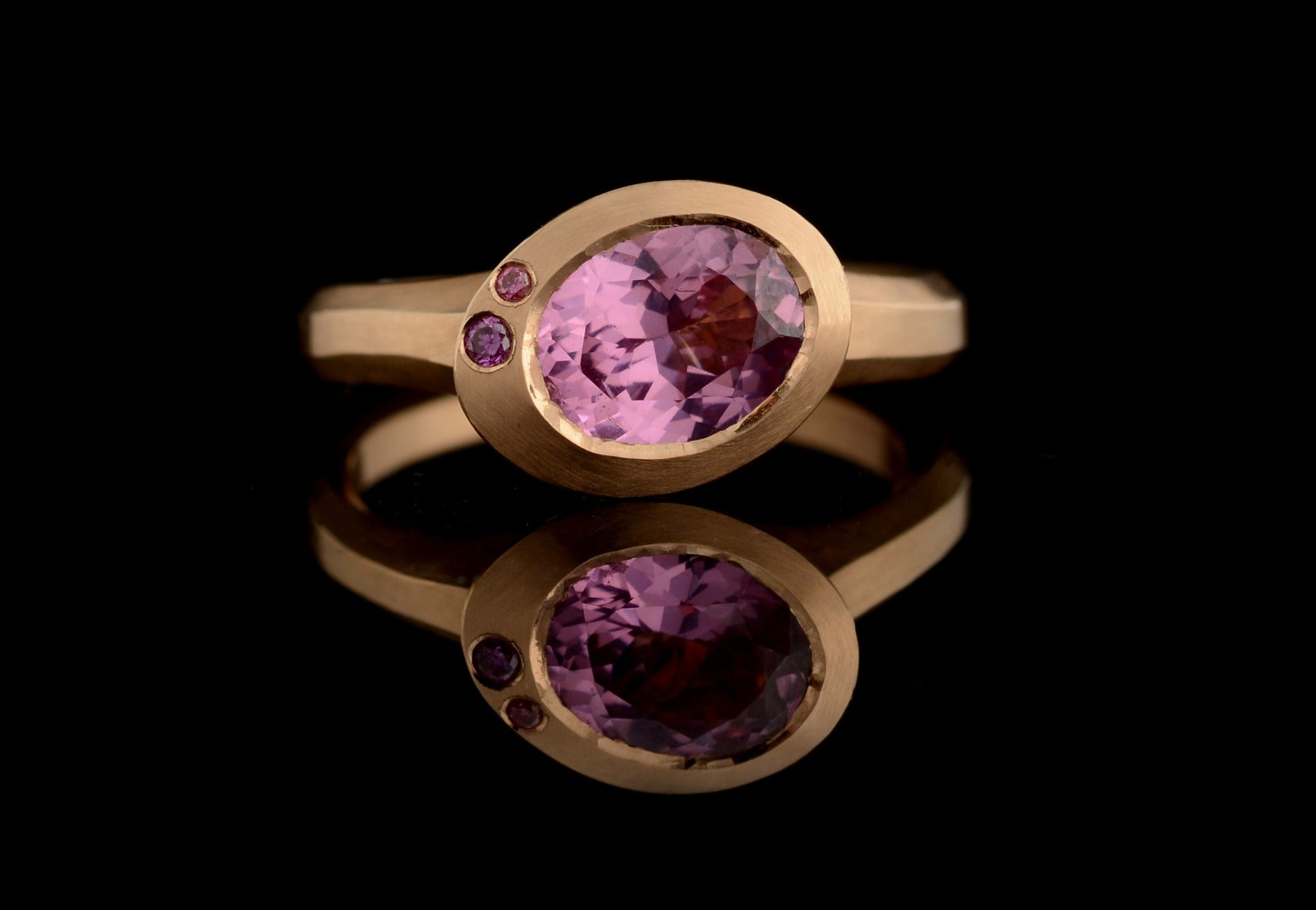 Rose gold Arris ring with oval pink spinel and pink diamonds