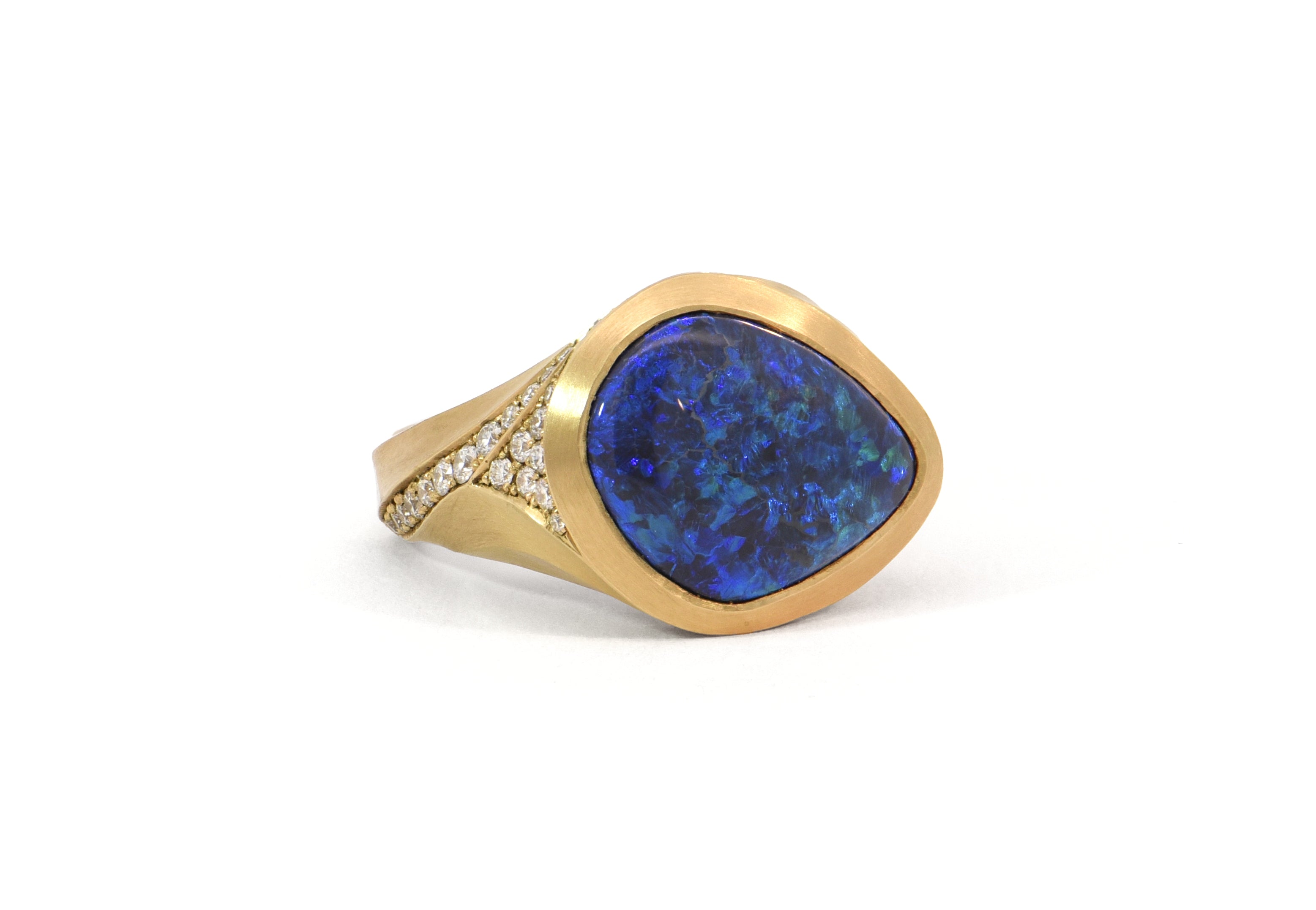 Lightning ridge opal and diamond Arris ring.