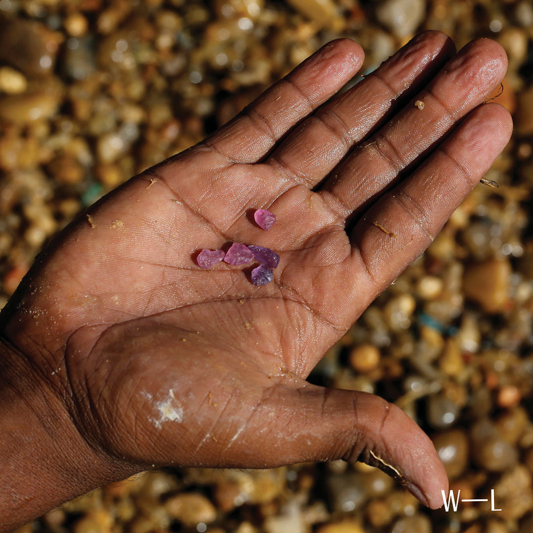 Rough cut stones in hand