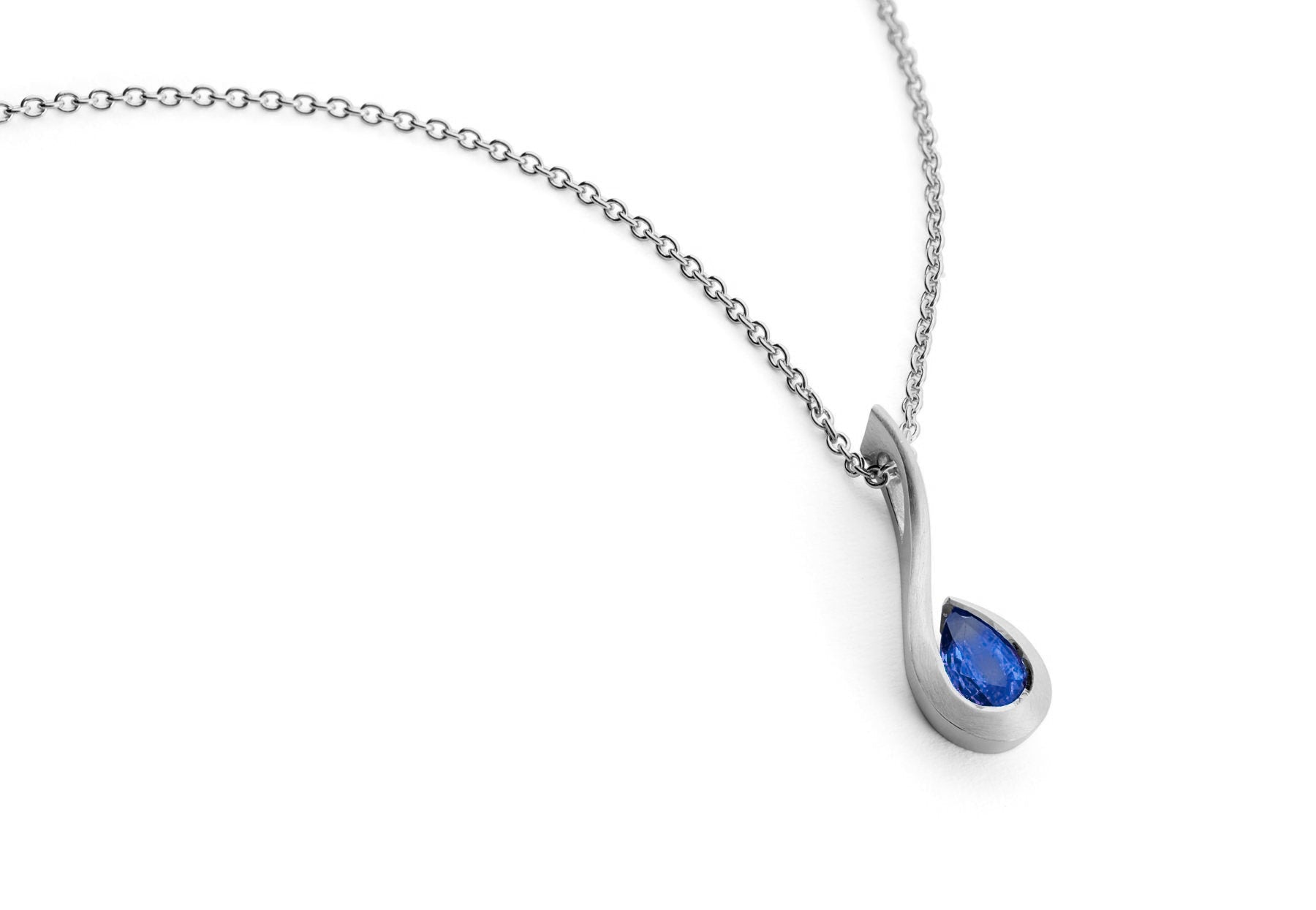 Platinum and pear shaped sapphire Twist pendant