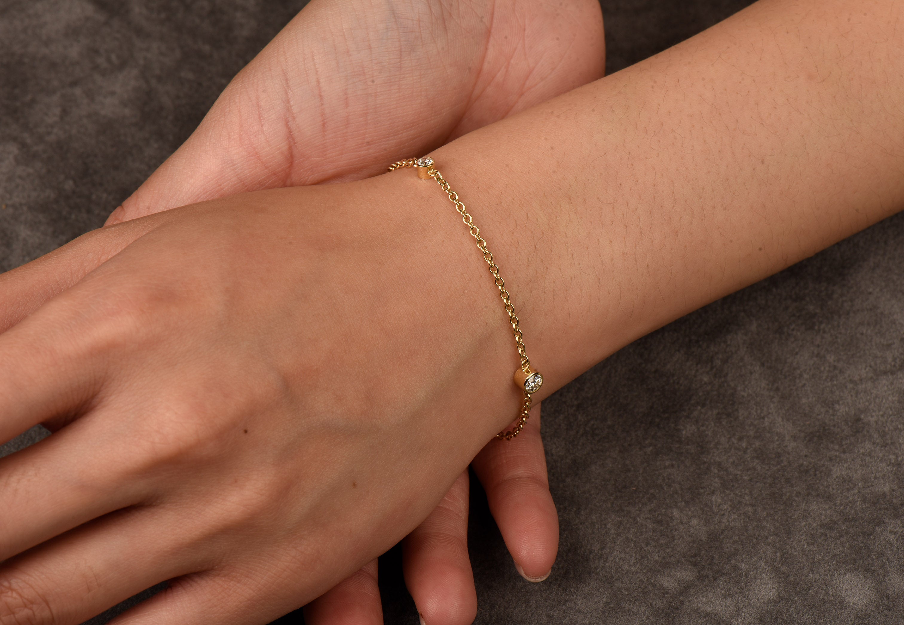 handmade dainty diamond bracelet with 3 diamond on 18ct gold chain