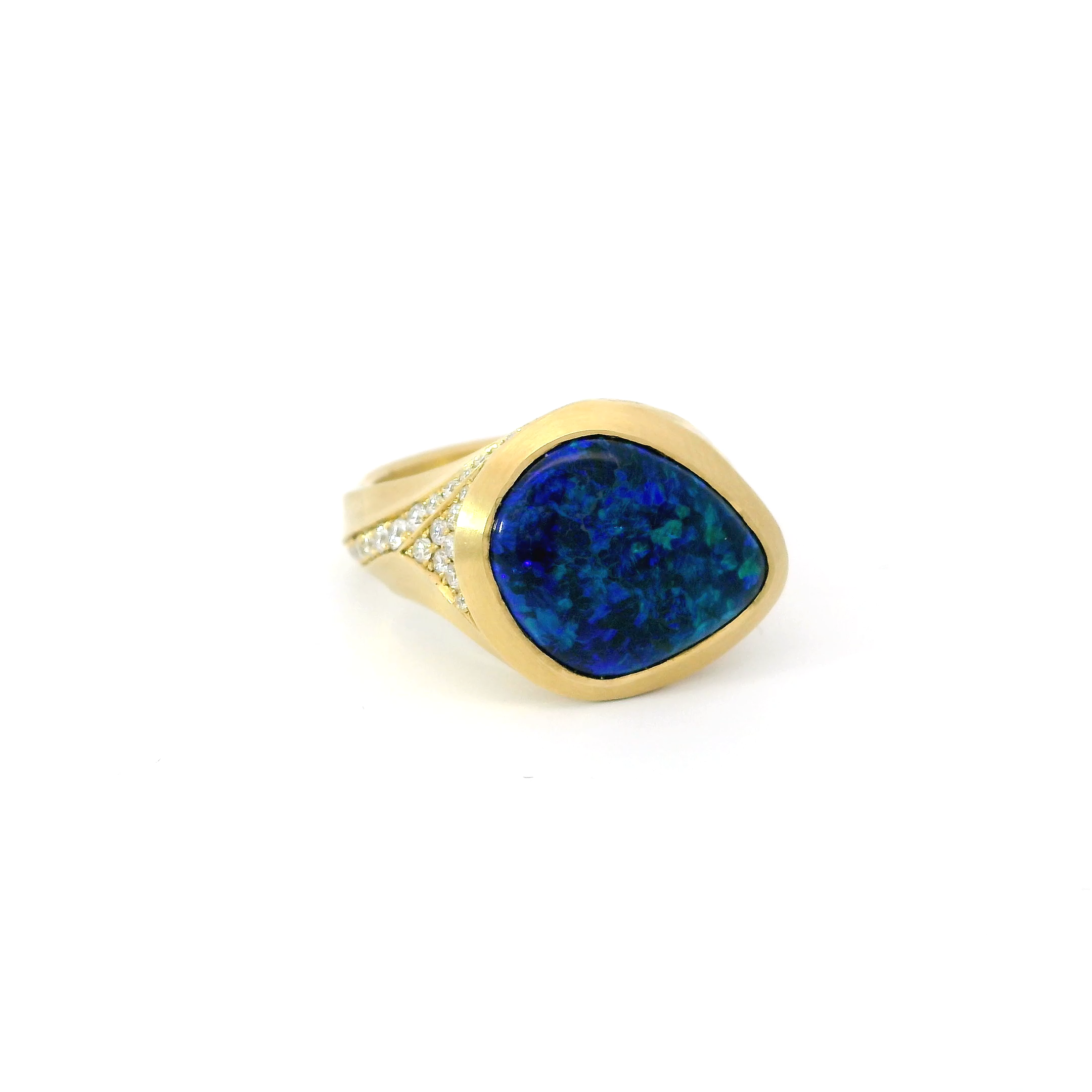 Lightning ridge opal and diamond Arris ring.