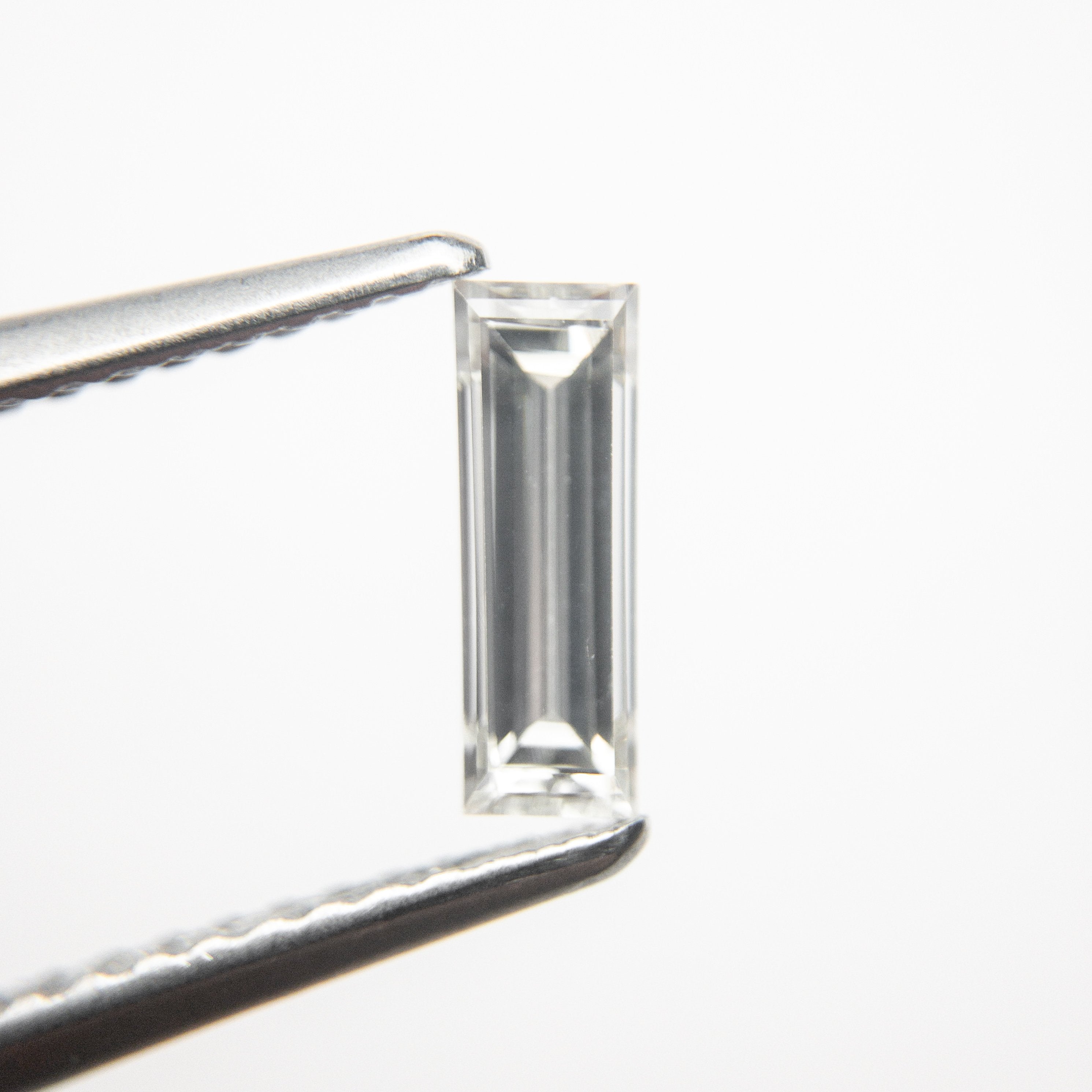 0.61ct 8.33x2.92x2.41mm Baguette Step Cut 19010-05-McCaul