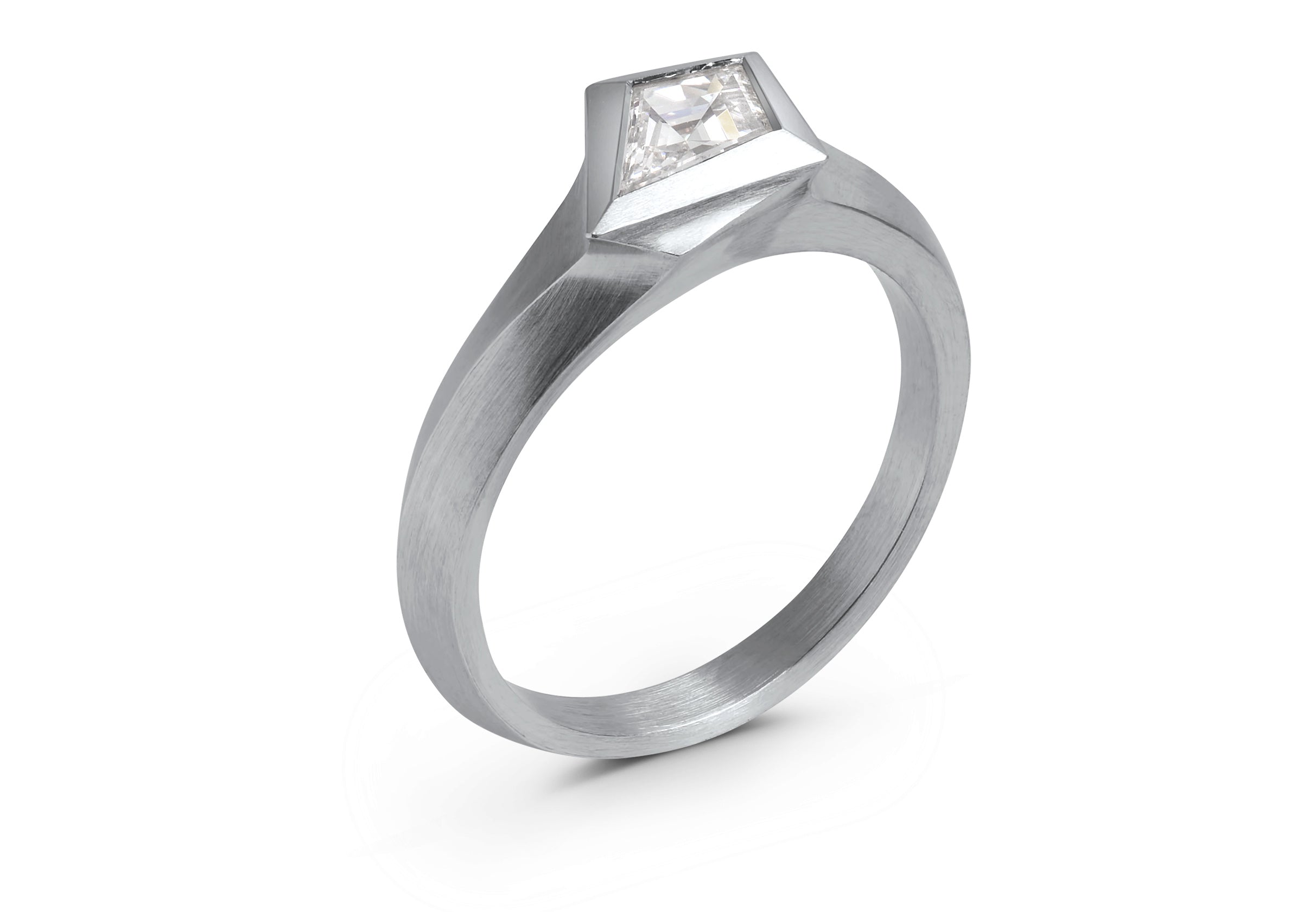 Platinum Aegis ring with kite shaped white diamond. 