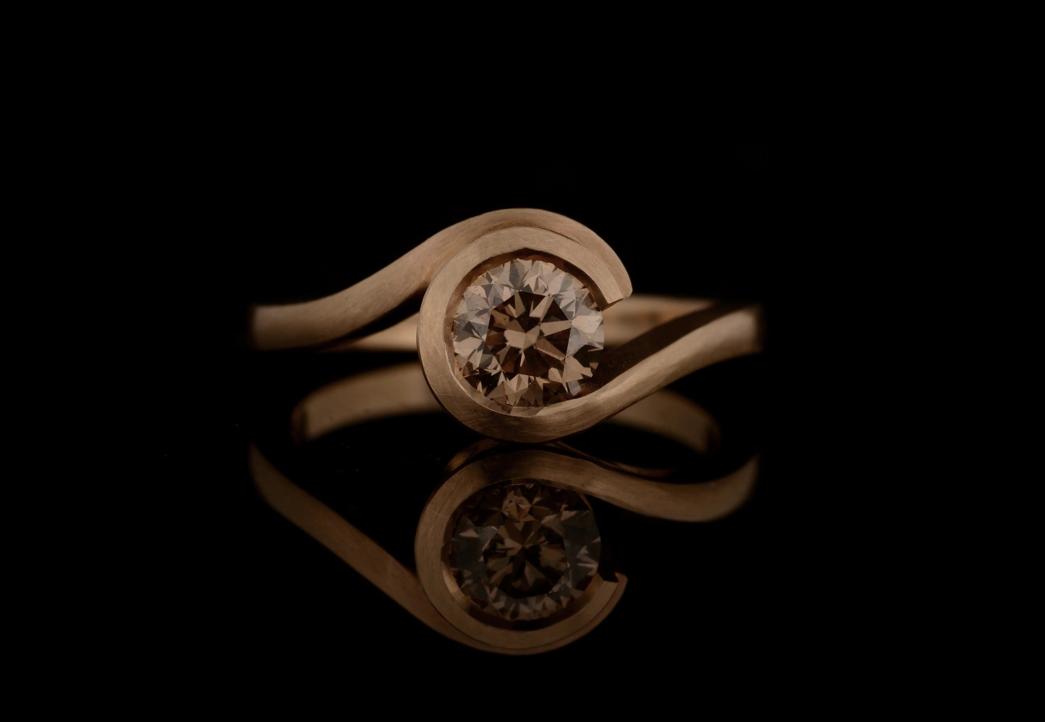 'Wave' rose gold engagement ring with cognac diamond